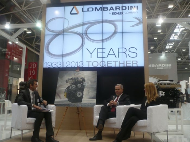 Al centro il presidente Gianni Borghi e alla sua sinistra Francesca Reggiani, direttore marketing durante l'Eima